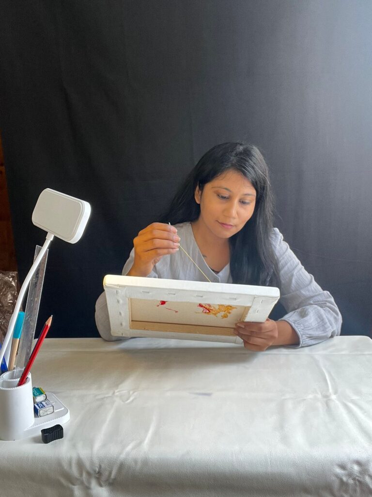 Embroidery artist working on a customized gift